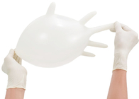 Los guantes disponibles del examen médico del látex los 24cm se pulverizan libremente